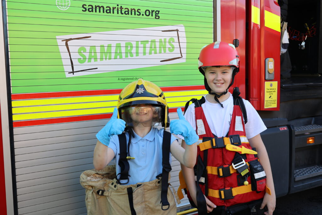 Two young people taking part in Fire Champions 